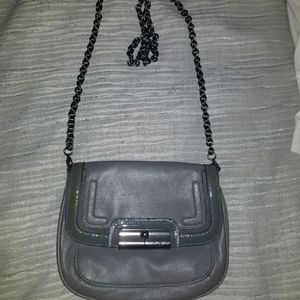 Small coach purse.
